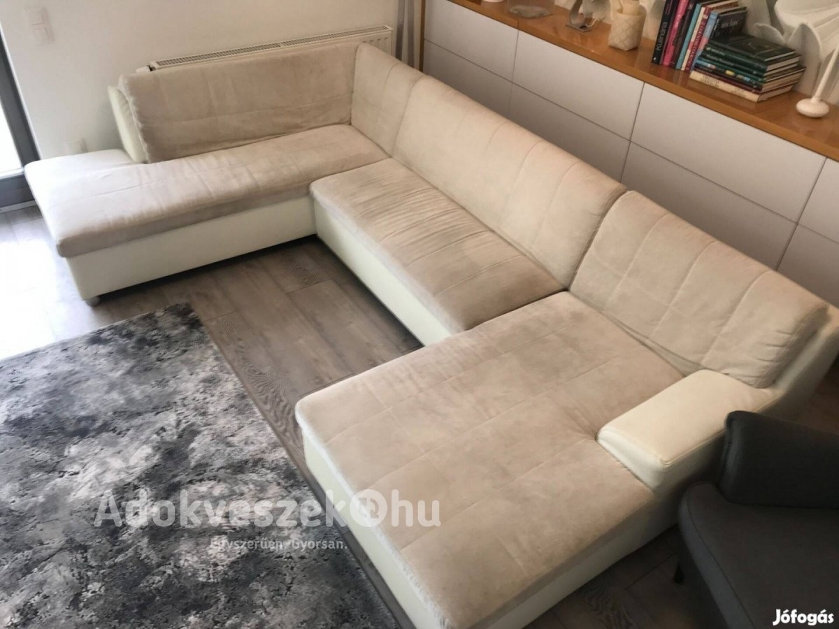 Fehér elegáns U alakú kanapé és hozzávaló puff eladó Budapesten
