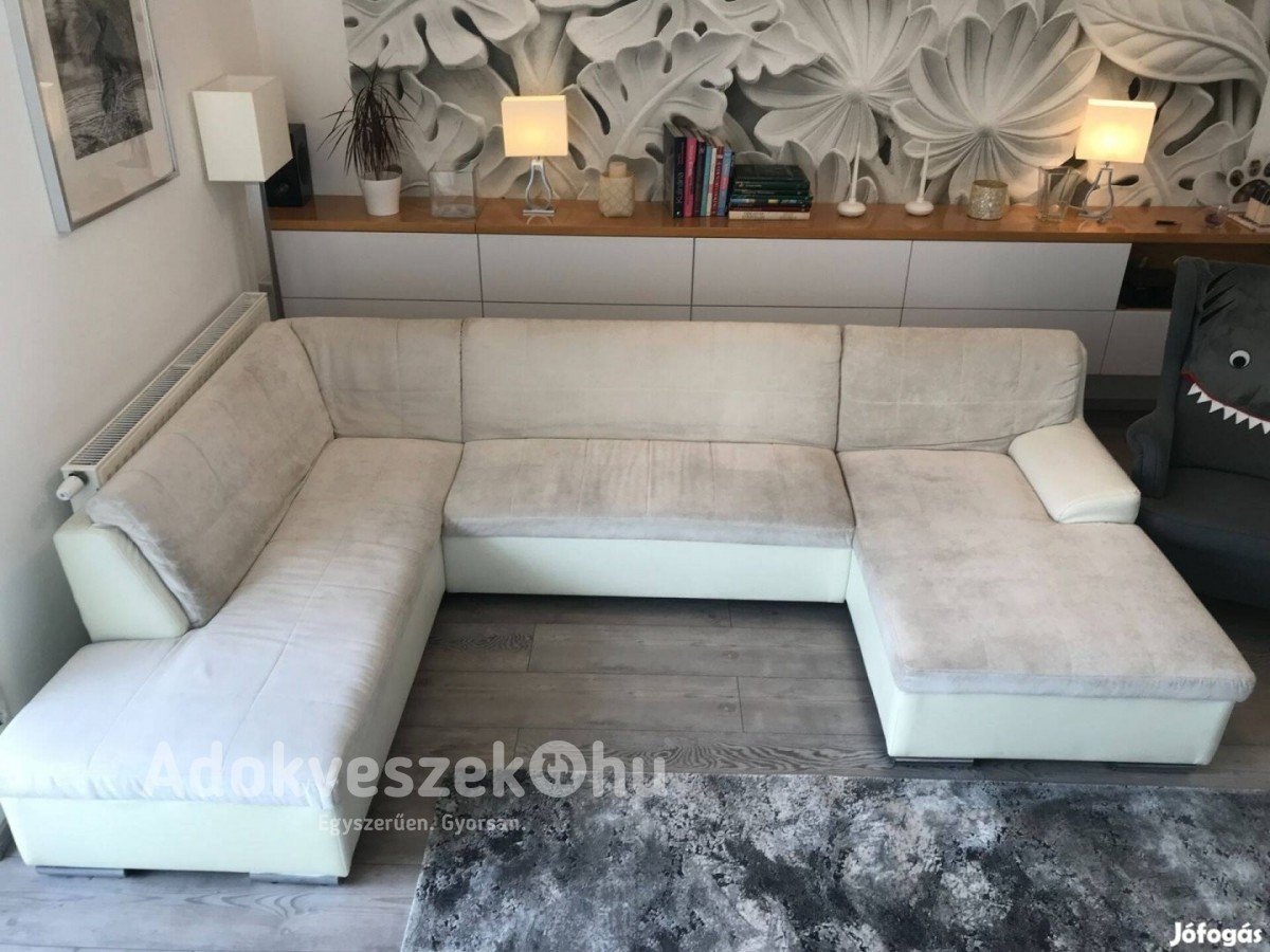 Fehér elegáns U alakú kanapé és hozzávaló puff eladó Budapesten